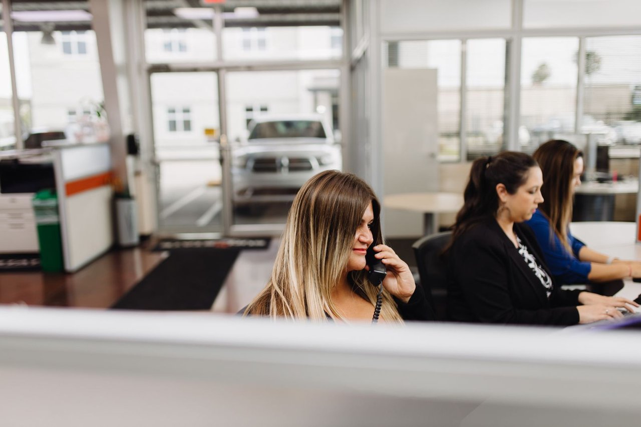 Sun State Trailers office staff on the phone assisting a customer