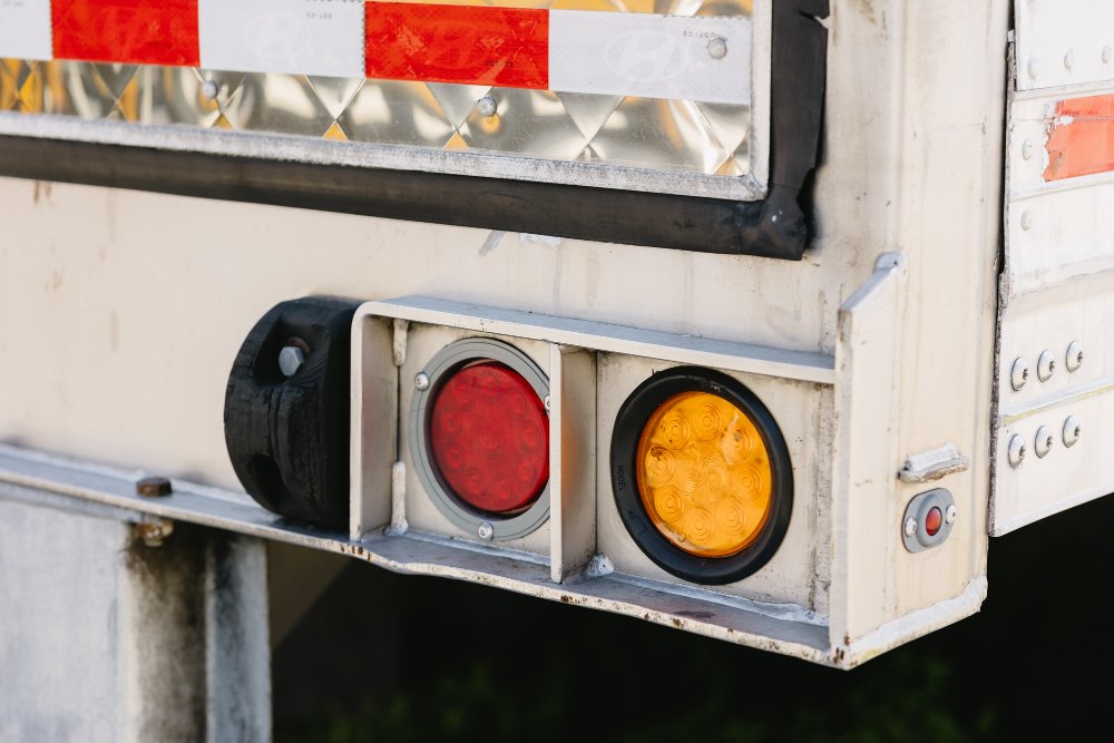 Close-up of a dry van trailer's rear lighting and structural detail