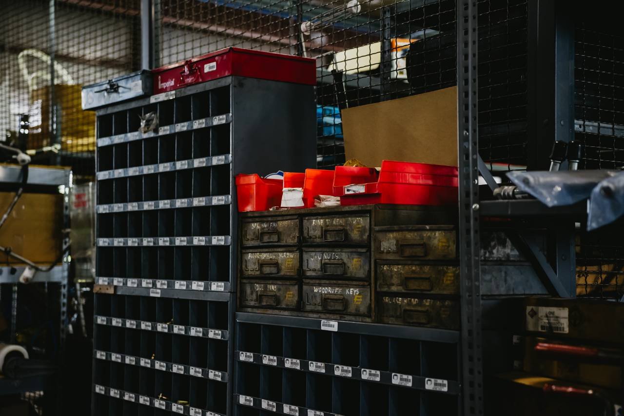 Close-up of Sun State International OEM and aftermarket parts storage bins