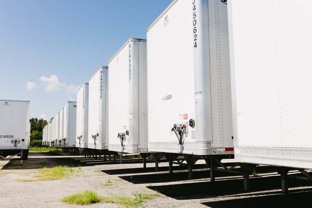 Row of Hyundai Translead dry van trailers parked side by side at Sun State Trailers
