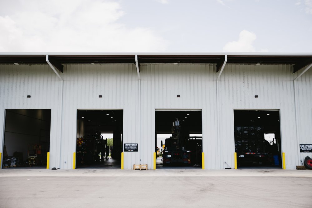 Sun State service bay doors with vehicles in for maintenance