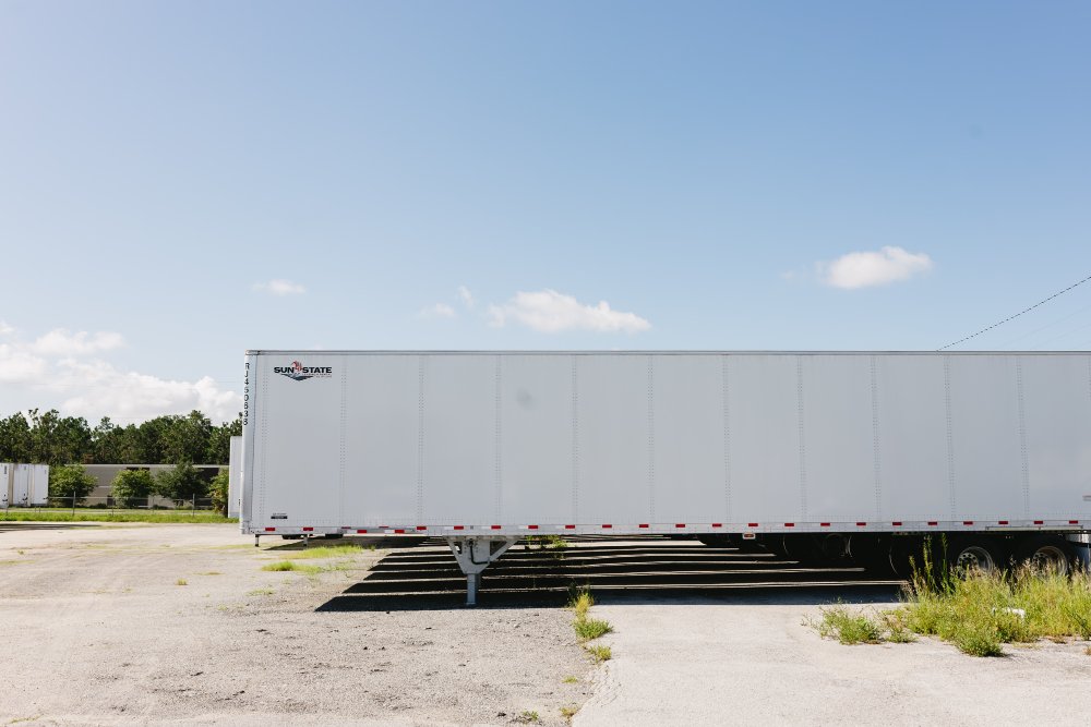 Sun State Trailers branded 53 ft dry van trailer parked in dealership inventory lot