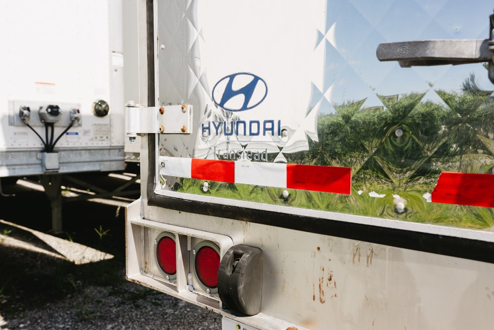 Close-up of a Hyundai Translead dry van trailer rear corner and logo detail