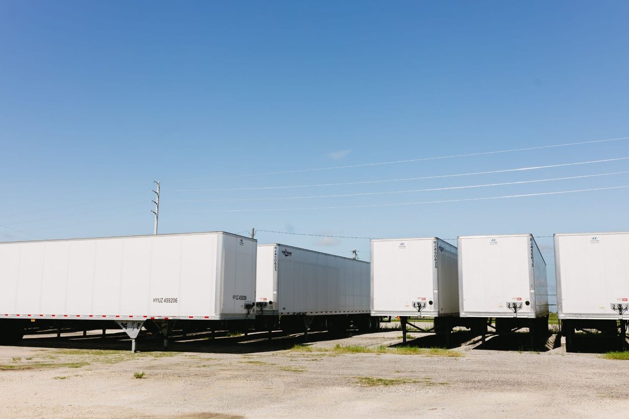 Row of Hyundai Translead dry van trailers parked at the Sun State lot