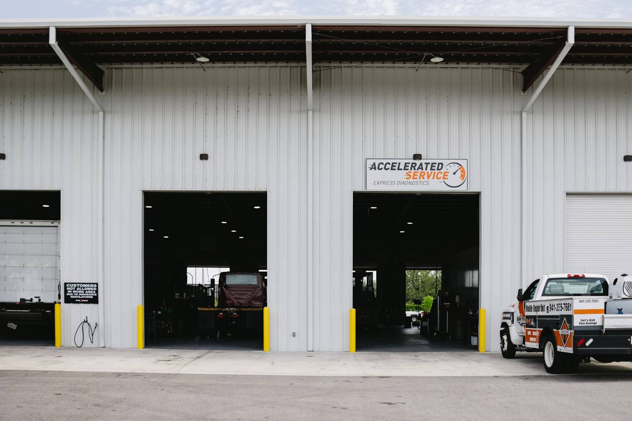 Exterior of the Sun State International accelerated service and express diagnostics bays
