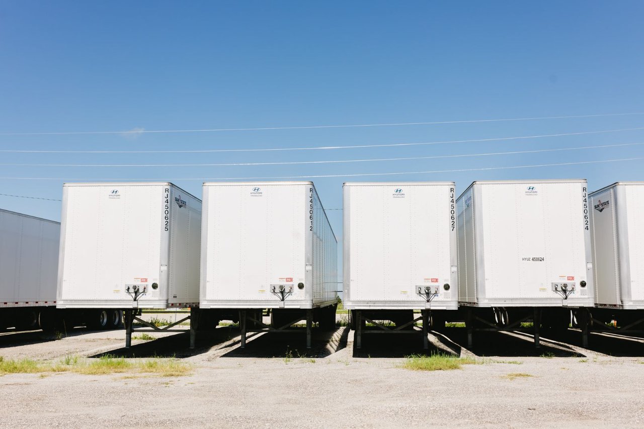 Row of Hyundai Translead trailers parked at Sun State Trailers