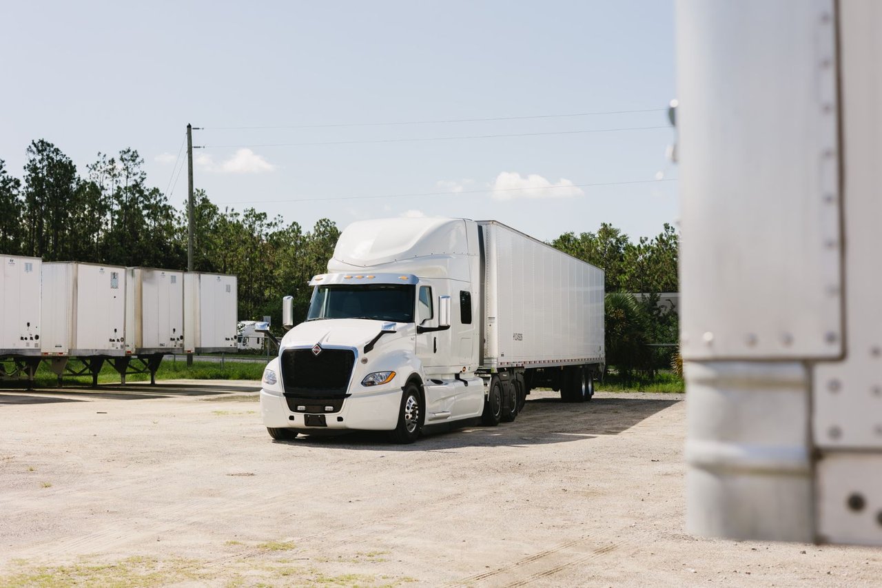 International day cab and trailer parked in the Sun State trailer yard